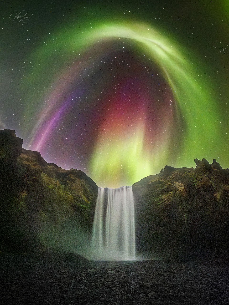 APOD: 2026 August 27 – Colorful Aurora over an Icelandic Waterfall
