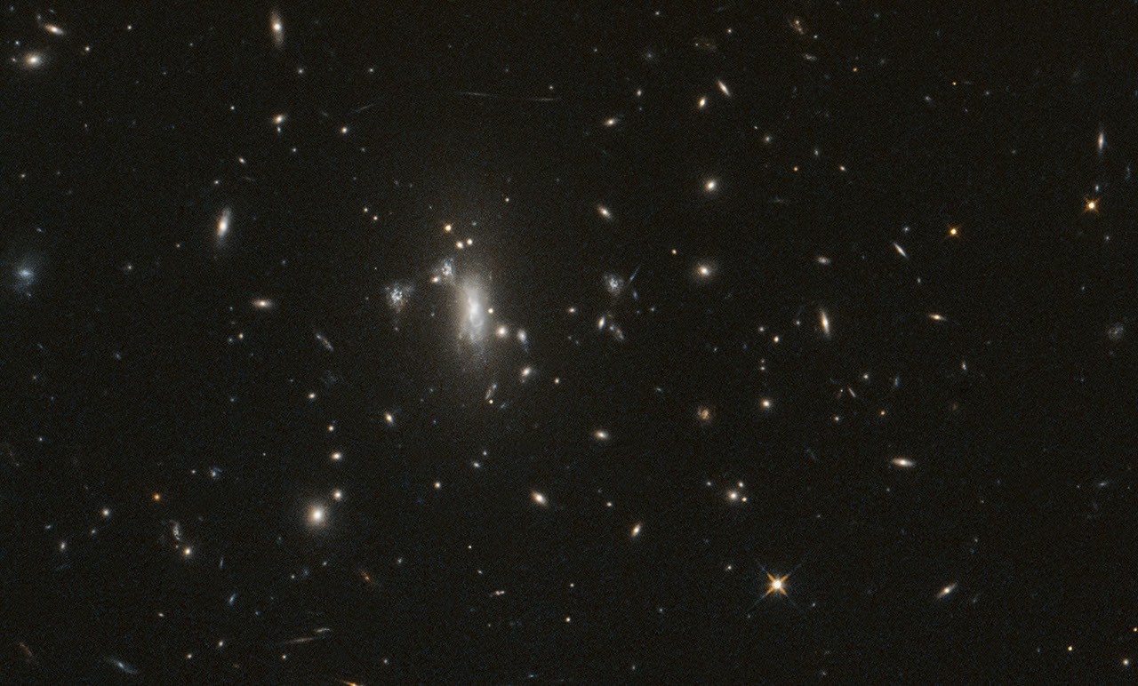 NASA’s Hubble Seeks Lensed Supernova, Marks 200,000 Orbits
