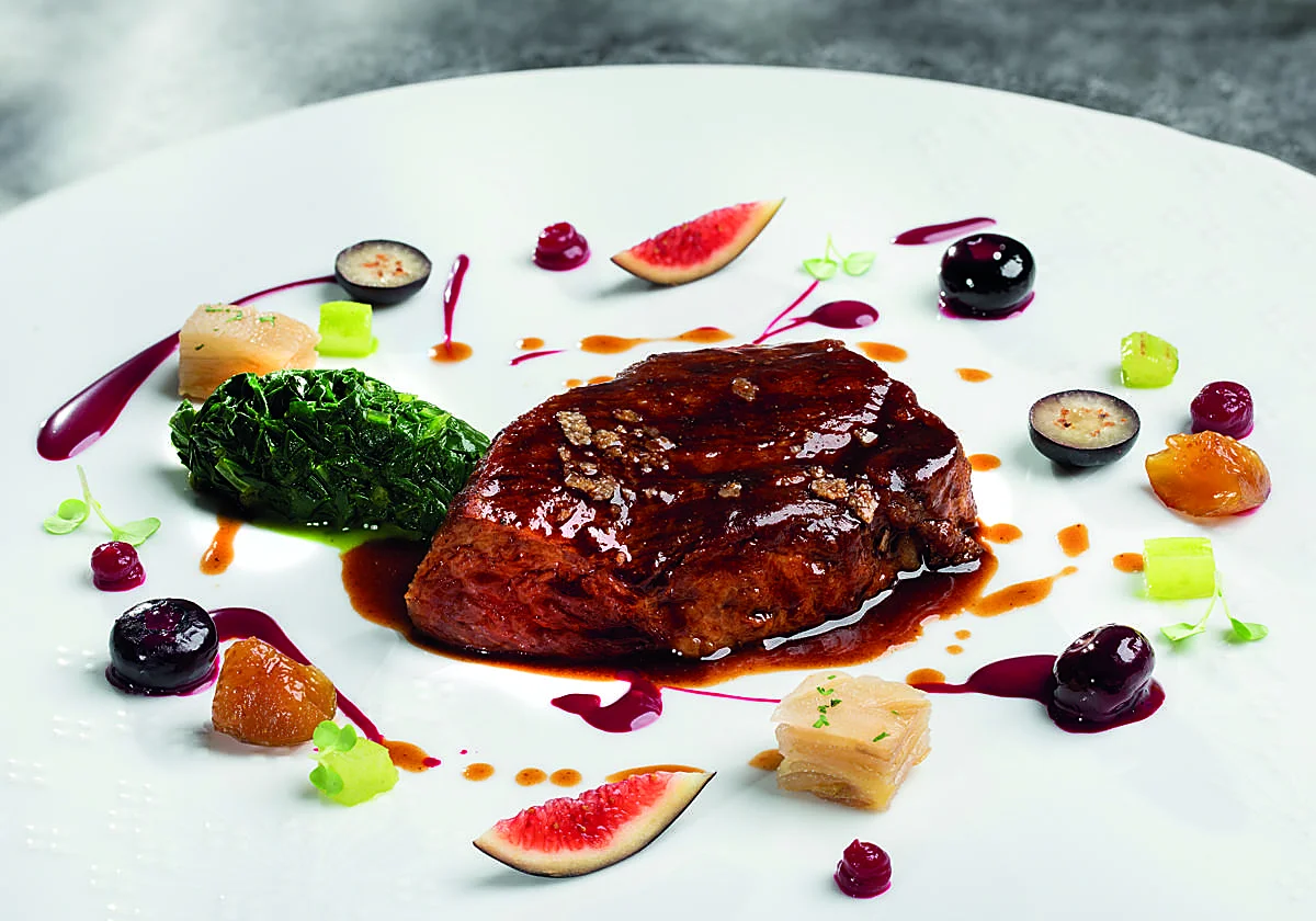 Cerdo ibérico con guiso de acelgas