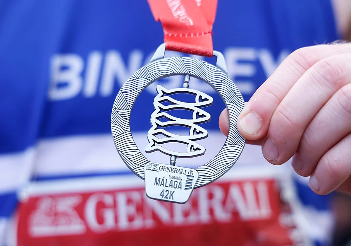 La medalla giratoria de espetos, la gran estrella del Maratón de Málaga