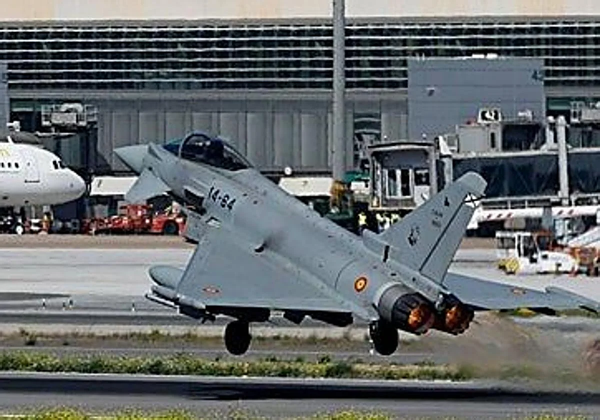 Two Eurofighters fly over Malaga's Plaza Mayor shopping centre