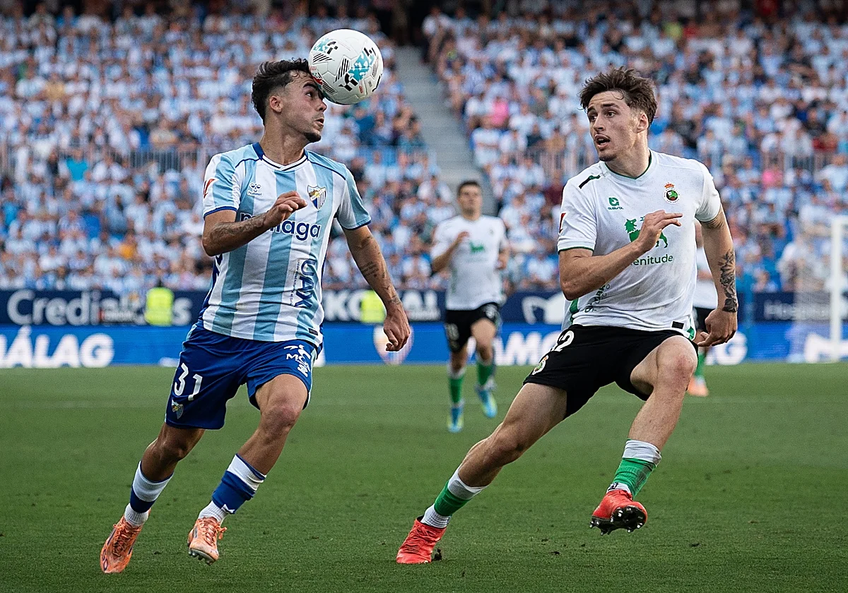 Una 'salvada' de Rafita en el descuento que mantiene al Málaga en zona de 'play-off'